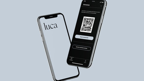 Luca-App Die Abbildung eines Handys mit der Luca-App auf dem Screen